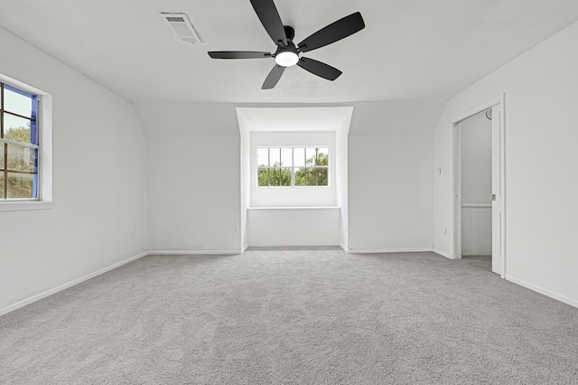 124 Rolling Wood Dr, Baytown, TX 77520 - spare room with carpet flooring, a ceiling fan, vaulted ceiling, and baseboards