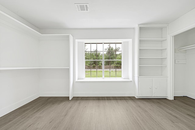 124 Rolling Wood Dr, Baytown, TX 77520 - interior space with wood finished floors and baseboards
