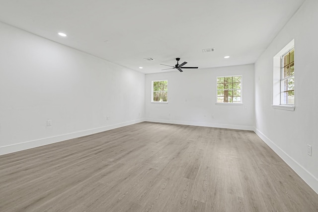 124 Rolling Wood Dr, Baytown, TX 77520 - spare room featuring light wood-style flooring, a ceiling fan, baseboards, and recessed lighting