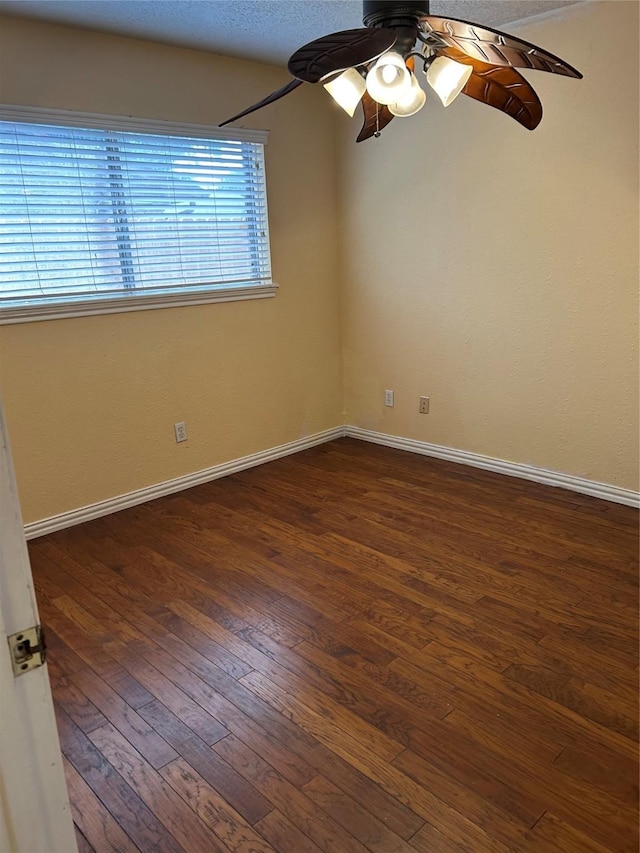 13802 Waterville Way, Houston, TX 77015 - empty room featuring ceiling fan, dark wood-style flooring, and baseboards