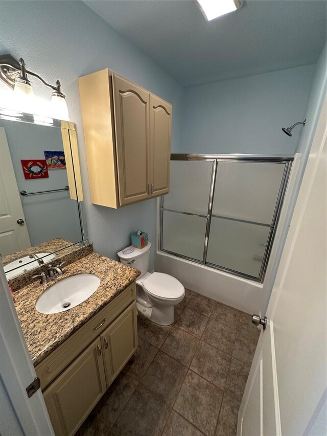 2108 Mills, Crystal Beach, TX 77650 - full bathroom with vanity, toilet, enclosed tub / shower combo, and tile patterned floors