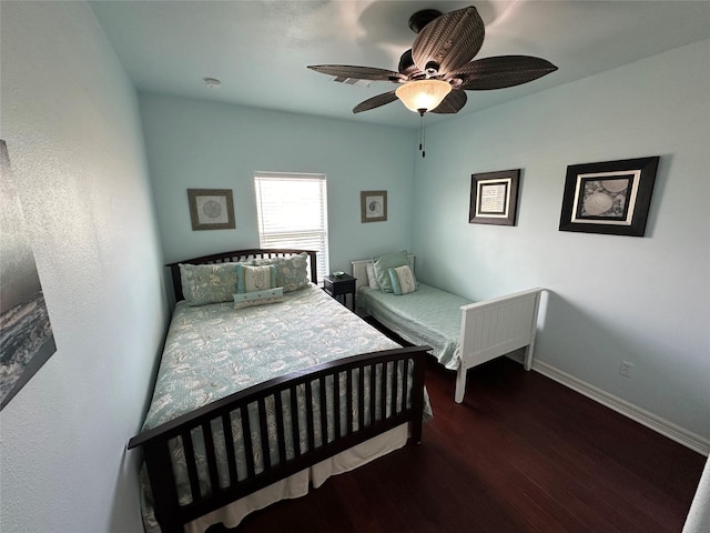 2108 Mills, Crystal Beach, TX 77650 - bedroom with wood finished floors, baseboards, and ceiling fan