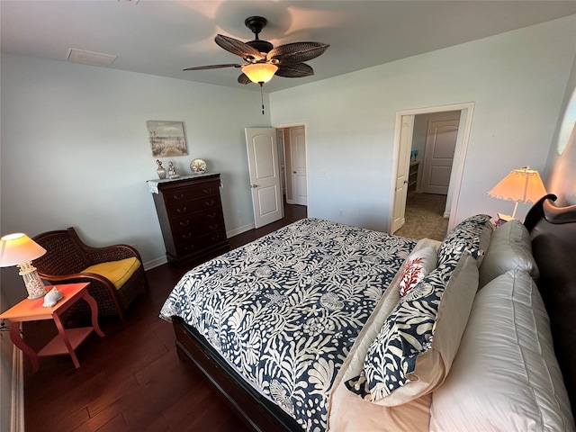 2108 Mills, Crystal Beach, TX 77650 - bedroom with wood finished floors, ceiling fan, and baseboards