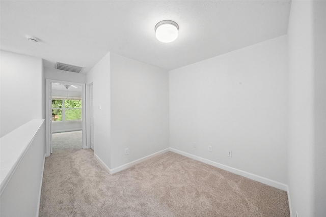 10 Fairlee Ct, The Woodlands, TX 77354 - unfurnished room featuring light colored carpet and baseboards