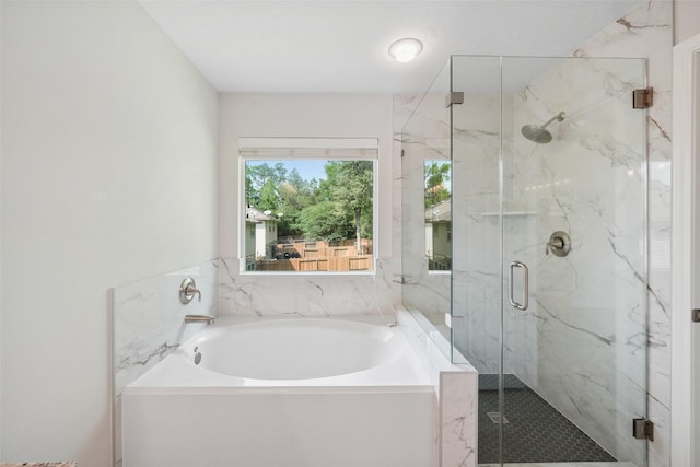 10 Fairlee Ct, The Woodlands, TX 77354 - bathroom featuring a bath and a marble finish shower
