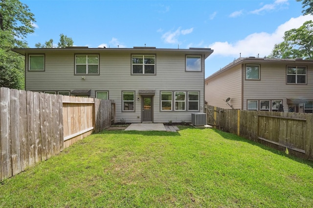 10 Fairlee Ct, The Woodlands, TX 77354 - back of house with a patio area and cooling unit