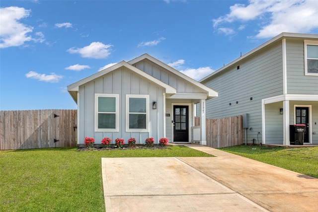 11947 Midas Ln, Willis, TX 77378 - view of front of property with board and batten siding