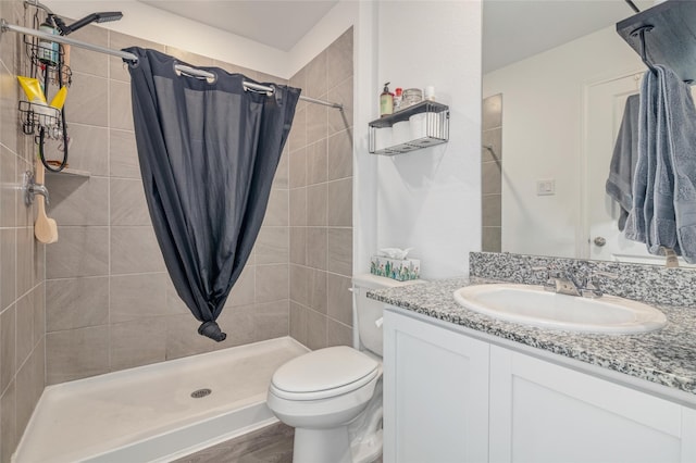11947 Midas Ln, Willis, TX 77378 - bathroom with vanity, tiled shower, and toilet