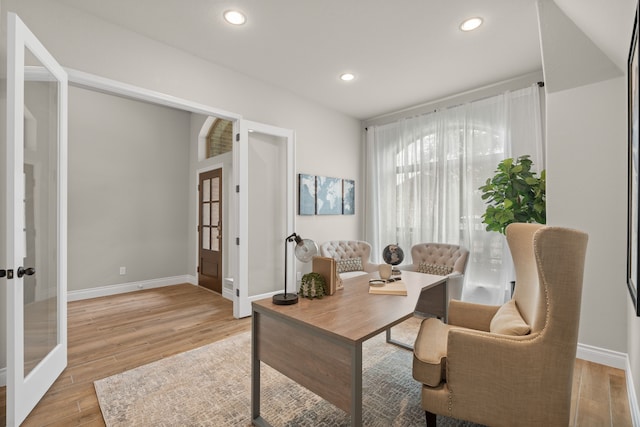 2915 Finch Ct, Katy, TX 77493 - office space with french doors, light wood finished floors, baseboards, and recessed lighting