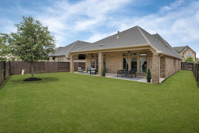 2915 Finch Ct, Katy, TX 77493 - rear view of house with brick siding, a ceiling fan, roof with shingles, and a patio area