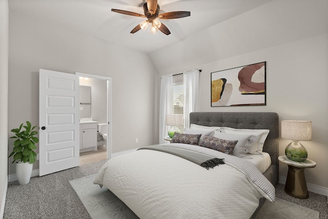 2915 Finch Ct, Katy, TX 77493 - bedroom featuring baseboards, light carpet, vaulted ceiling, ensuite bath, and ceiling fan