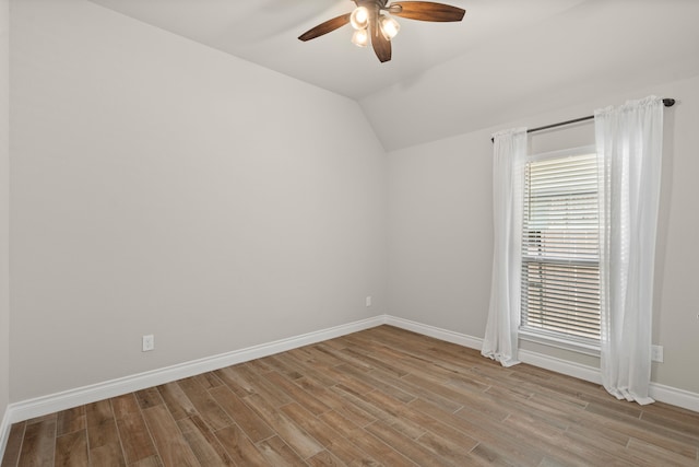 2915 Finch Ct, Katy, TX 77493 - unfurnished room with a ceiling fan, wood finished floors, baseboards, and lofted ceiling