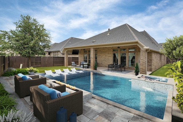 2915 Finch Ct, Katy, TX 77493 - view of swimming pool featuring a patio area, outdoor lounge area, a ceiling fan, and a fenced backyard