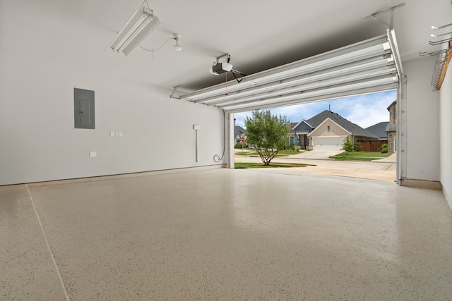 2915 Finch Ct, Katy, TX 77493 - garage featuring electric panel and a garage door opener