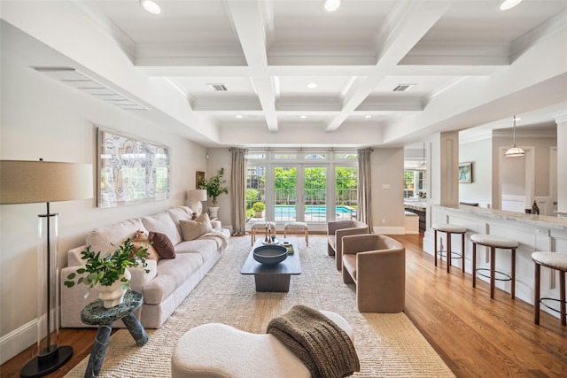 2202 Sul Ross St, Houston, TX 77098 - living room featuring wood finished floors, beam ceiling, coffered ceiling, recessed lighting, and baseboards