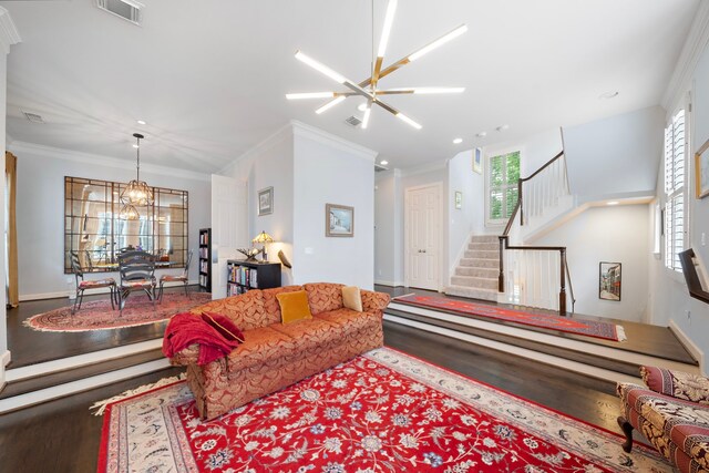 4305 Feagan St, Houston, TX 77007 - living room featuring wood finished floors, stairway, a chandelier, ornamental molding, and recessed lighting