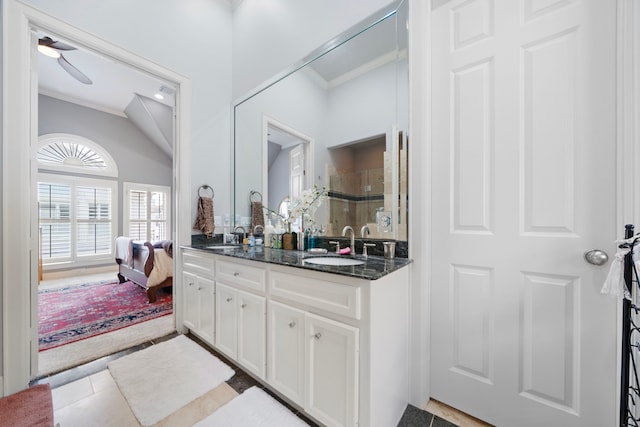 4305 Feagan St, Houston, TX 77007 - full bath featuring ornamental molding, double vanity, a tile shower, tile patterned floors, and a ceiling fan