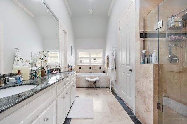 4305 Feagan St, Houston, TX 77007 - bathroom featuring double vanity, a garden tub, and a shower stall