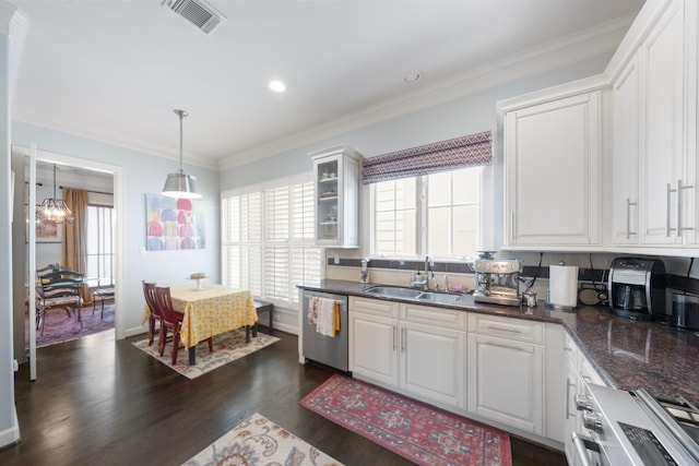 4305 Feagan St, Houston, TX 77007 - kitchen featuring dishwasher, a sink, healthy amount of natural light, dark wood-style flooring, and crown molding