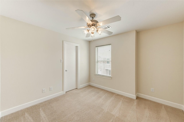 3721 Main Poplar Dr, Houston, TX 77025 - unfurnished room featuring ceiling fan, baseboards, and light carpet