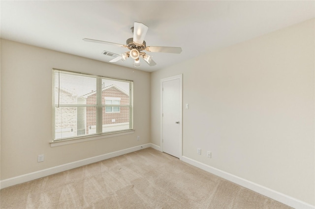 3721 Main Poplar Dr, Houston, TX 77025 - carpeted empty room featuring baseboards and a ceiling fan