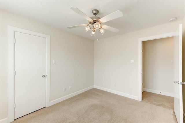 3721 Main Poplar Dr, Houston, TX 77025 - empty room with light colored carpet, ceiling fan, and baseboards