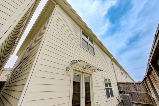 3721 Main Poplar Dr, Houston, TX 77025 - view of side of property featuring french doors and cooling unit