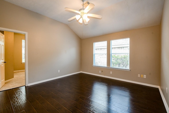 18002 Outback Lakes Trl, Humble, TX 77346 - empty room featuring a ceiling fan, lofted ceiling, baseboards, and dark wood finished floors