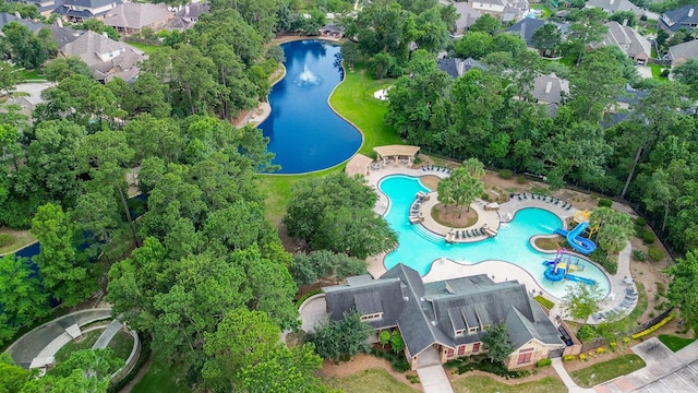 18002 Outback Lakes Trl, Humble, TX 77346 - aerial overview of property's location featuring a pool, a large body of water, and nearby suburban area