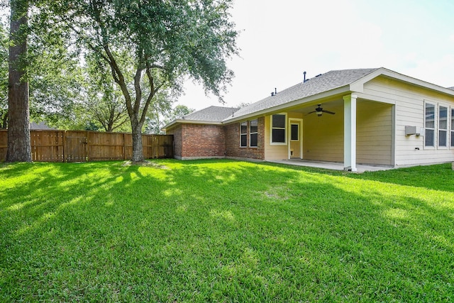 18002 Outback Lakes Trl, Humble, TX 77346 - rear view of house with ceiling fan, a patio, a gate, and a shingled roof