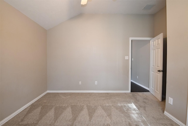 18002 Outback Lakes Trl, Humble, TX 77346 - unfurnished room with carpet, lofted ceiling, baseboards, and a ceiling fan