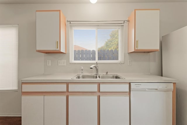 6427 Burdine Ct, Houston, TX 77085 - kitchen with dishwasher, a sink, light countertops, and white cabinets