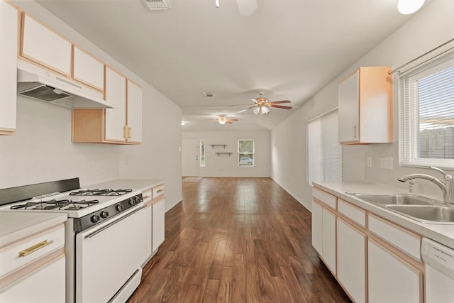 6427 Burdine Ct, Houston, TX 77085 - kitchen featuring white appliances, under cabinet range hood, a sink, ceiling fan, and dark wood-style flooring
