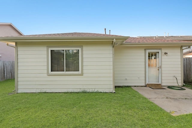 6427 Burdine Ct, Houston, TX 77085 - rear view of house with a patio and a shingled roof