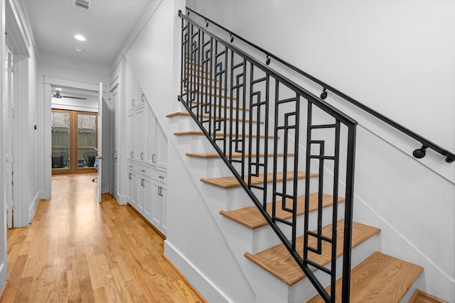 208 Aurora St Unit B, Houston, TX 77008 - stairs with wood finished floors, baseboards, and recessed lighting