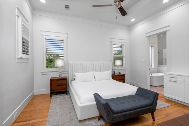 208 Aurora St Unit B, Houston, TX 77008 - bedroom featuring light wood-style floors, baseboards, recessed lighting, a ceiling fan, and ensuite bath