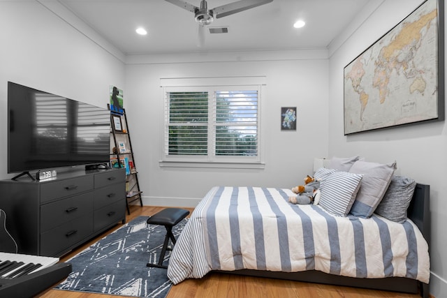 208 Aurora St Unit B, Houston, TX 77008 - bedroom featuring baseboards, wood finished floors, and recessed lighting