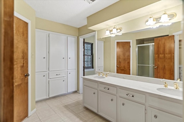 30814 Quinn Rd, Tomball, TX 77375 - bathroom with double vanity, a shower stall, tile patterned floors, a chandelier, and toilet