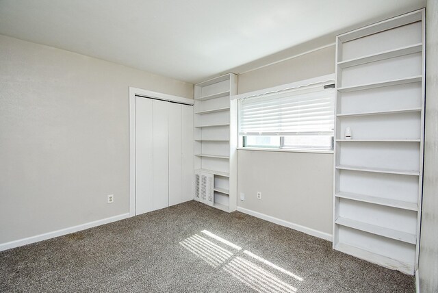 16806 Grampin Dr, Houston, TX 77084 - unfurnished bedroom with carpet, a closet, and baseboards
