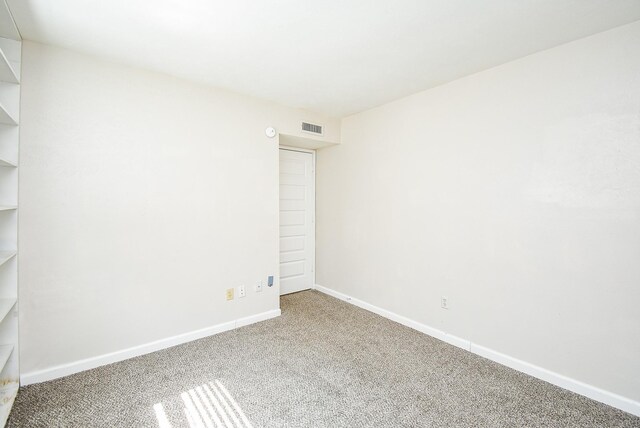 16806 Grampin Dr, Houston, TX 77084 - carpeted spare room with baseboards