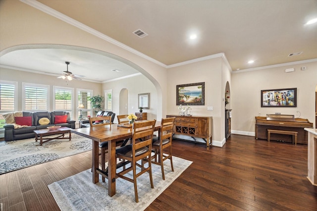 5131 Anthony Springs Ln, Sugar Land, TX 77479 - dining space with arched walkways, dark wood-style flooring, ceiling fan, recessed lighting, and crown molding