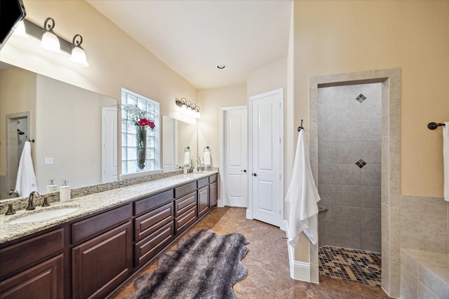 5131 Anthony Springs Ln, Sugar Land, TX 77479 - full bath with a walk in shower, double vanity, and tile patterned floors