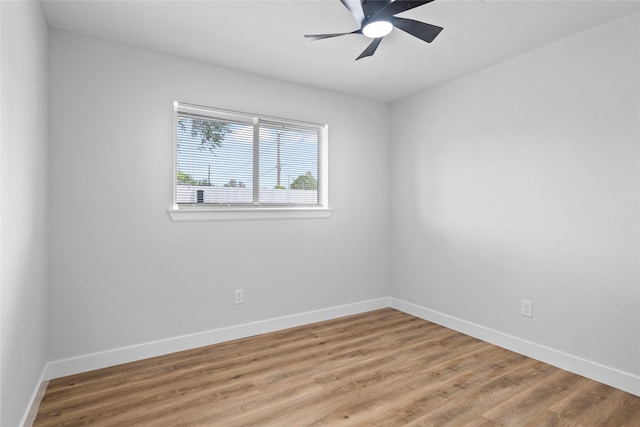 5115 Clay St, Houston, TX 77023 - unfurnished room featuring baseboards, light wood-style flooring, and ceiling fan