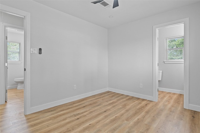 5115 Clay St, Houston, TX 77023 - unfurnished room featuring plenty of natural light, a ceiling fan, and light wood-type flooring