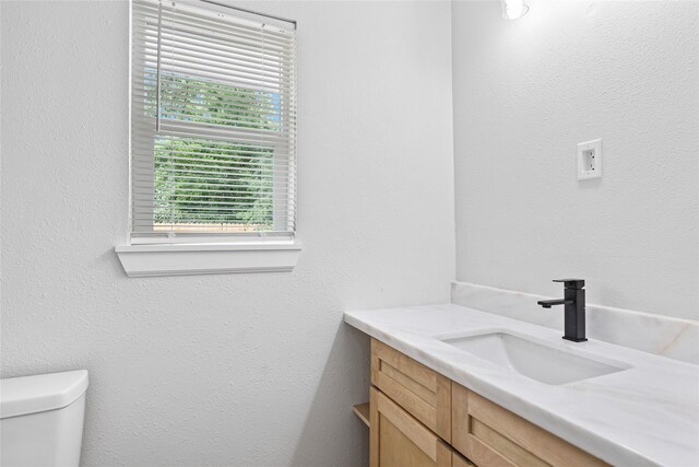 5115 Clay St, Houston, TX 77023 - bathroom with vanity and toilet