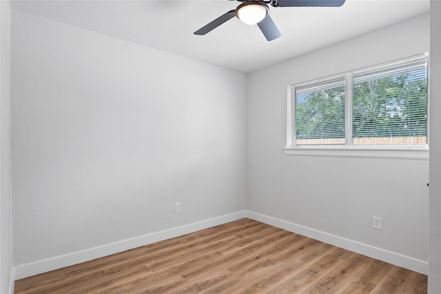 5115 Clay St, Houston, TX 77023 - empty room with baseboards, light wood-style flooring, and a ceiling fan