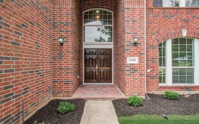24206 Moon Ridge Ct, Katy, TX 77494 - doorway to property featuring brick siding