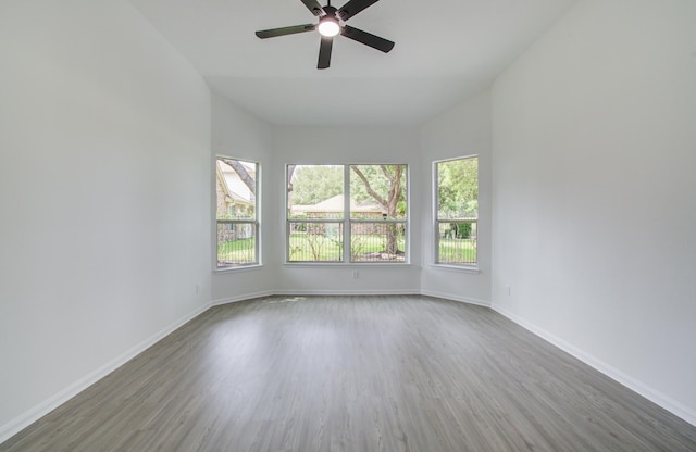 24206 Moon Ridge Ct, Katy, TX 77494 - spare room with wood finished floors, ceiling fan, and baseboards
