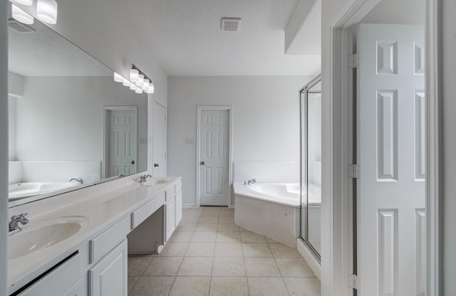 24206 Moon Ridge Ct, Katy, TX 77494 - full bath featuring a bath, double vanity, a shower stall, and tile patterned flooring