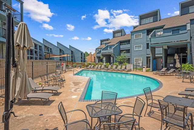 12500 Melville Dr Unit 218B, Montgomery, TX 77356 - community pool with a residential view and a patio area